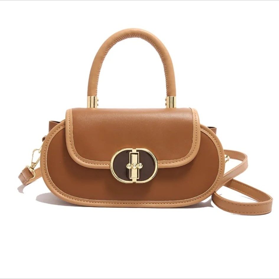 Bolso Ovalado Cognac con Broche Dorado